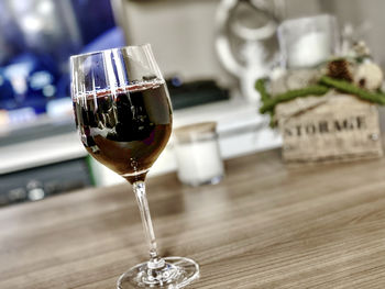 Close-up of wine in glass on table