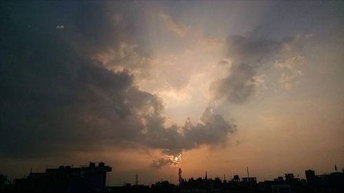 Scenic view of cloudy sky at sunset