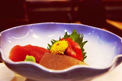 Close-up of fruits in plate on table