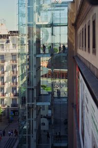 Reflection of buildings on glass window