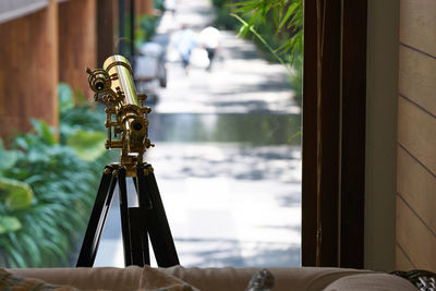 Close-up of telescope on table