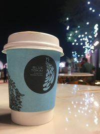 Close-up of coffee cup on table