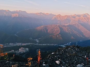 High angle view of rocks and mountains against sky