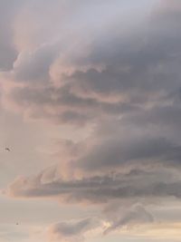 Low angle view of cloudy sky during sunset