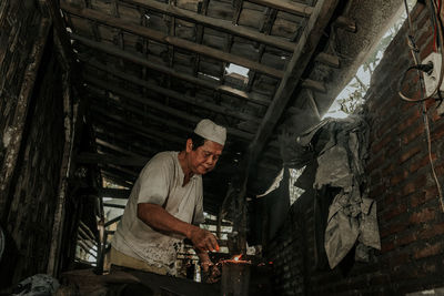 Man working in shopping mall