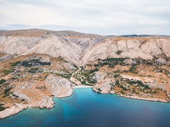 High angle view of rock formations against sky