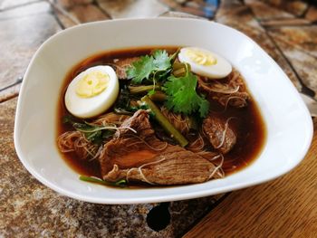 High angle view of soup served on table