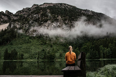 Rear view of woman looking at mountain