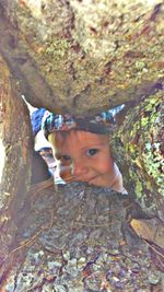 Portrait of cute boy in cave