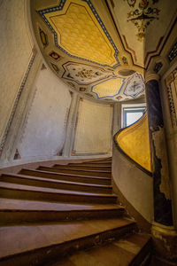 Low angle view of staircase in old building