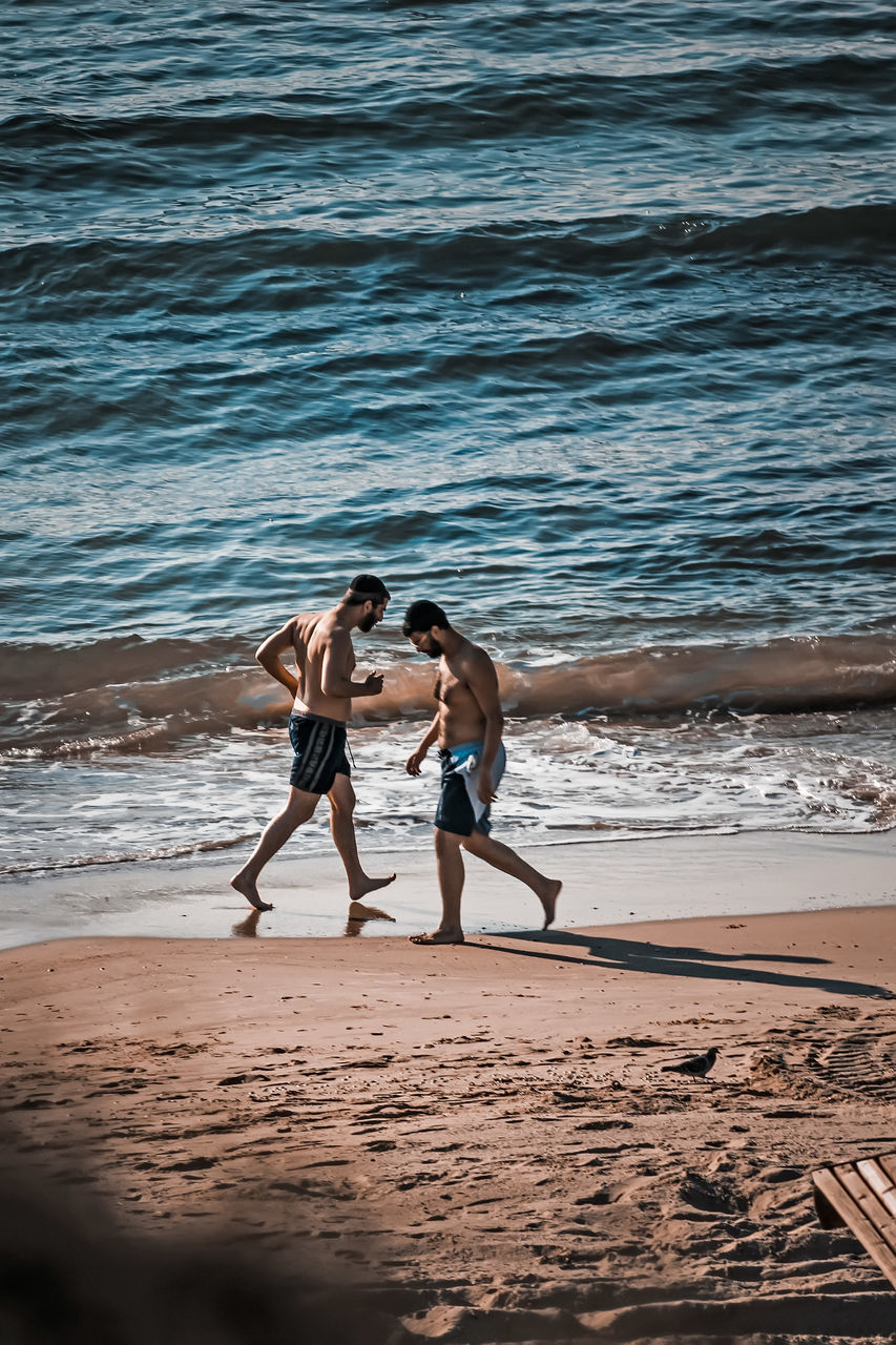 Photo by Edi Libedinsky  ig: @postprodok ig: @edilibedinsky Beach Sea Water Land Two People Sand Togetherness Full Length Love Lifestyles Leisure Activity Women Men Nature Real People Adult Couple - Relationship Bonding People Positive Emotion Outdoors