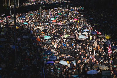 High angle view of people on street in city