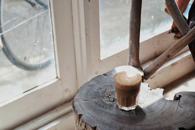 High angle view of coffee cup on table