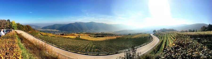 Panoramic view of agricultural landscape against sky