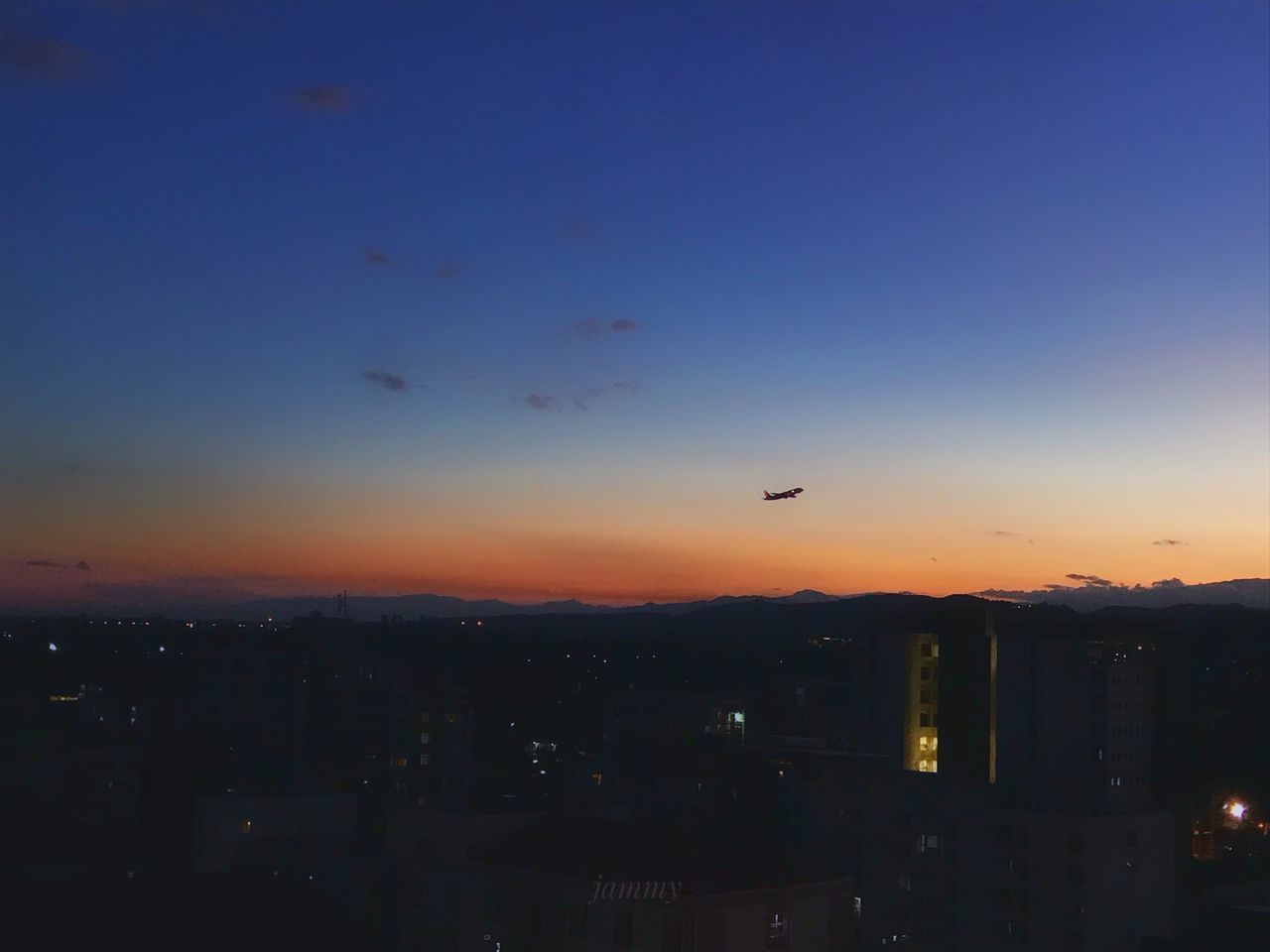 SILHOUETTE OF CITY AT SUNSET