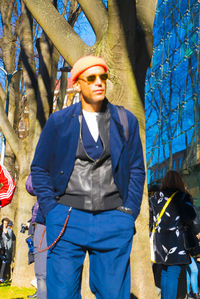 Full length of young man standing outdoors