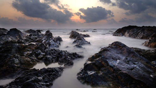 Scenic view of sea against sky during sunset