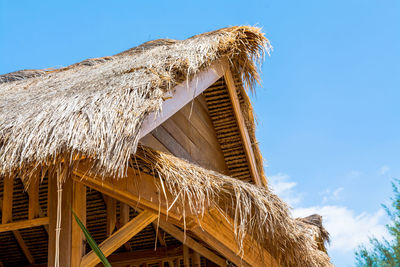 Low angle view of barn against sky