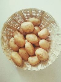 High angle view of fruits in basket on table