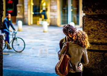 Couple kissing on the street