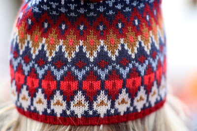 Cropped image of woman wearing knit hat