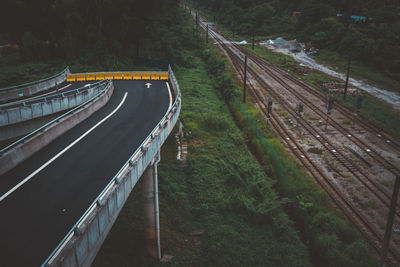 High angle view of bridge by railroad tracks