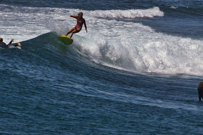 Man surfing in sea