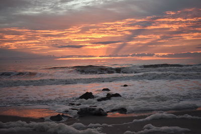 Scenic view of sea against sky during sunset