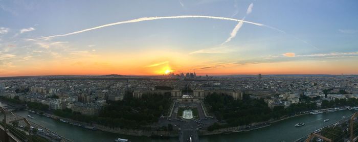 High angle view of city against sky during sunset