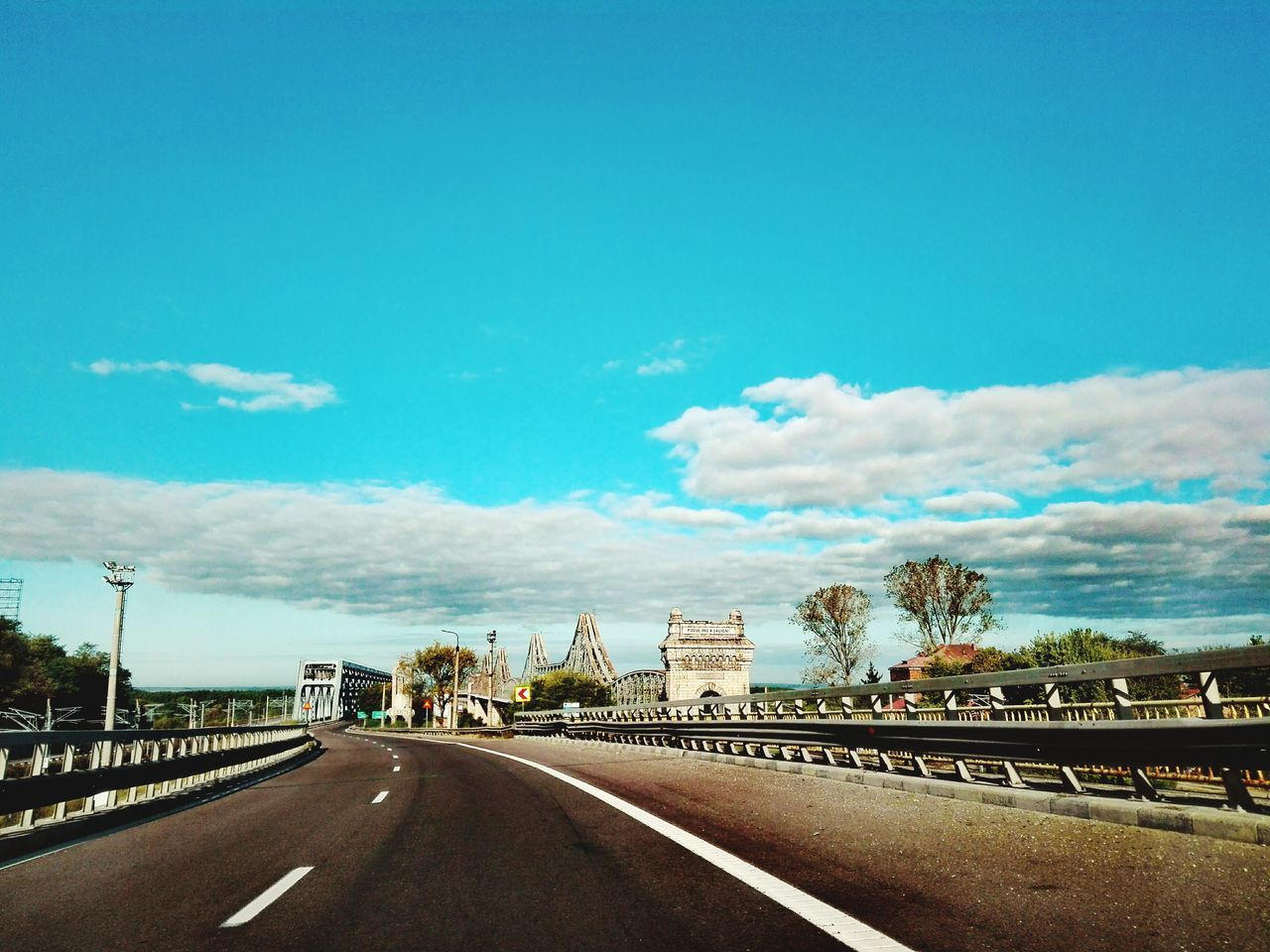 EMPTY ROAD ALONG BUILDINGS