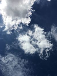 Low angle view of clouds in blue sky