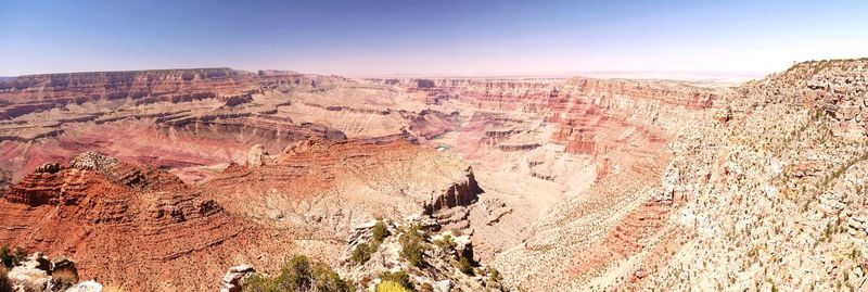 Scenic view of rock formations against sky