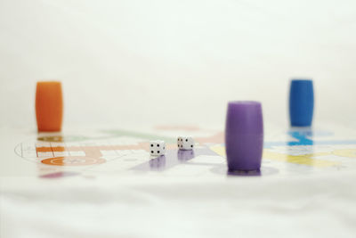 Close-up of objects on table against white background