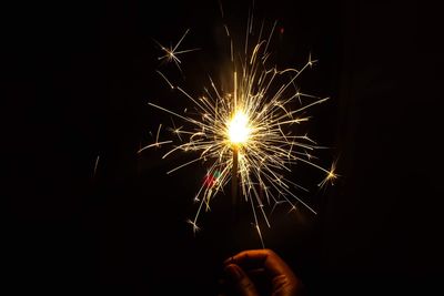 Firework display at night