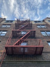 Low angle view of building against sky. fire escape in downtown new york 