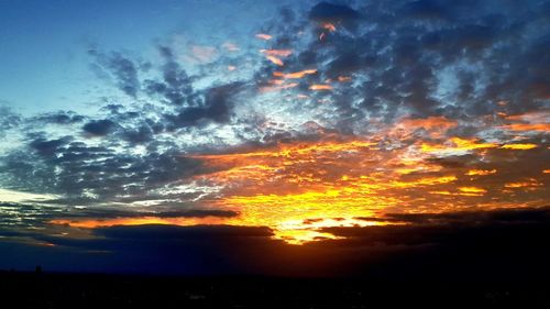 Scenic view of dramatic sky during sunset