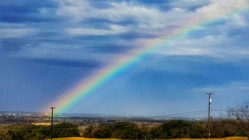 Scenic view of rainbow against sky