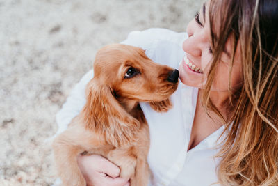 Woman with dog at park