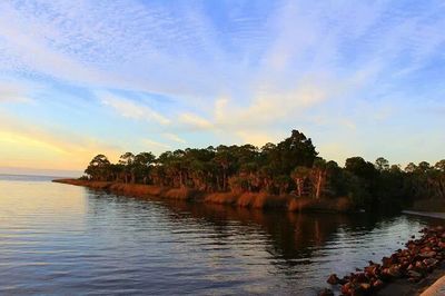 Scenic view of sea at sunset