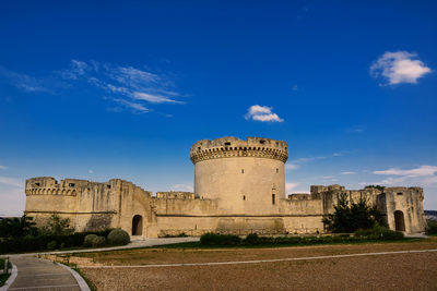 View of fort against blue sky