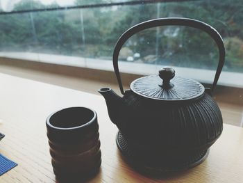 Close-up of tea cup on table