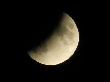 Low angle view of moon against sky at night