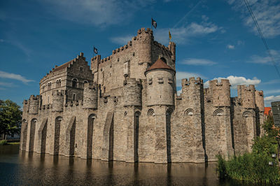 Stone wall and tower at the gravensteen castle in ghent. a city with gothic buildings in belgium.