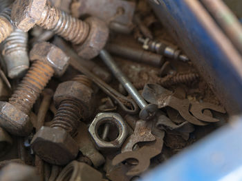 High angle view of rusty work tools