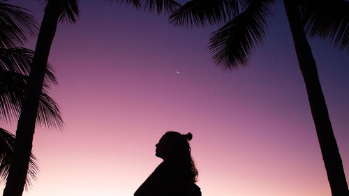 Low angle view of silhouette man against sky at sunset