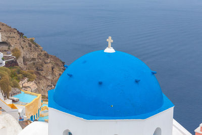 Detail of blue dome in the village of oia, santorini, greece