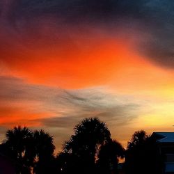 Scenic view of dramatic sky at sunset