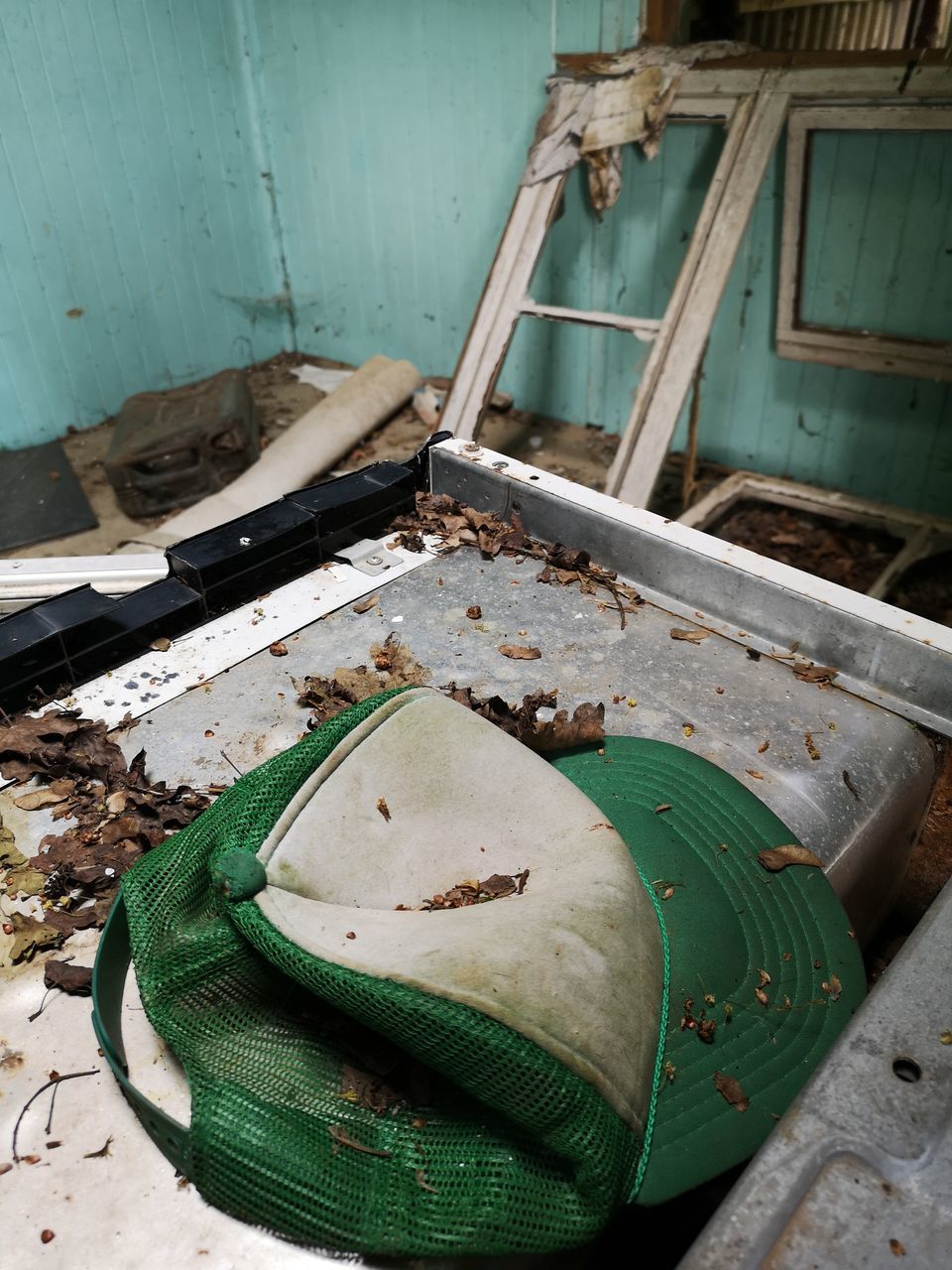 HIGH ANGLE VIEW OF OLD RUSTY METAL CONTAINER