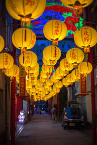 Illuminated lanterns hanging at night