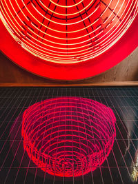 Low angle view of illuminated lighting equipment